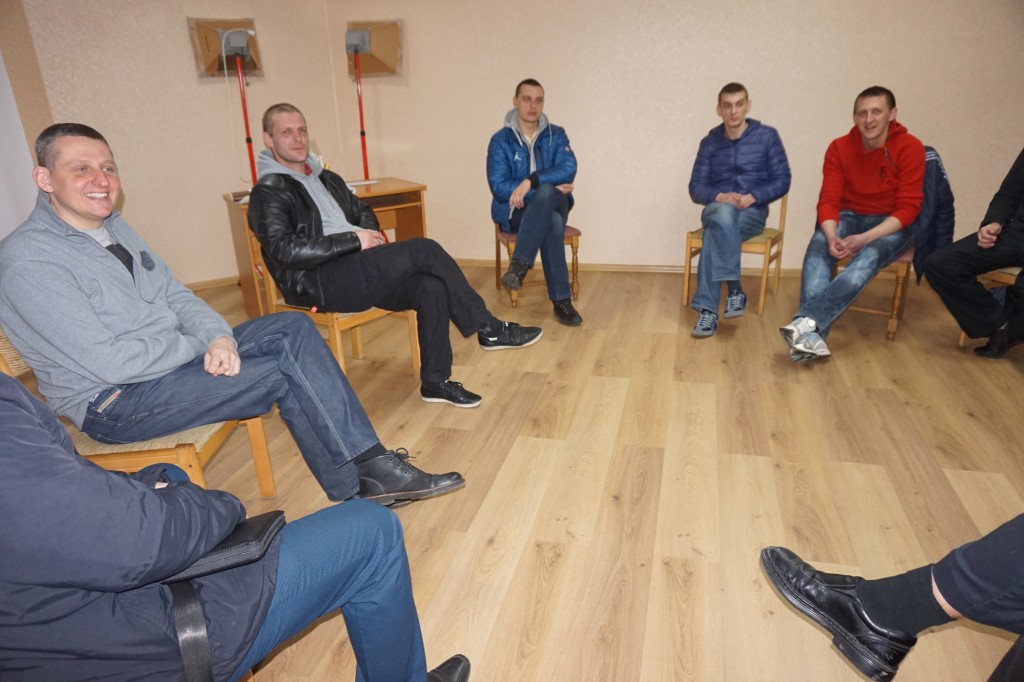 Ruslan (on the left) leading a session at the drug rehab centre